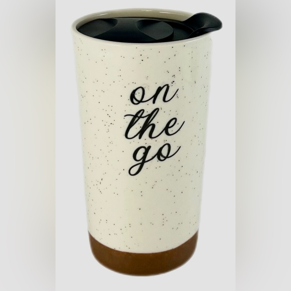 10 Strawberry Street ceramic “On The Go” coffeee tumbler.